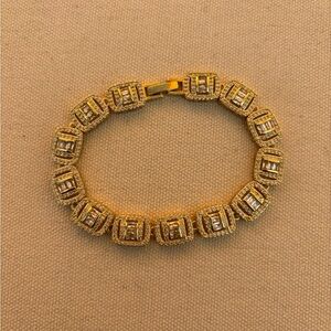 Elegant Gold Bracelet with Silver Accents